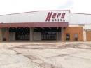 A recent photo of the entrance to Hara Arena, as included in the auction announcement.
